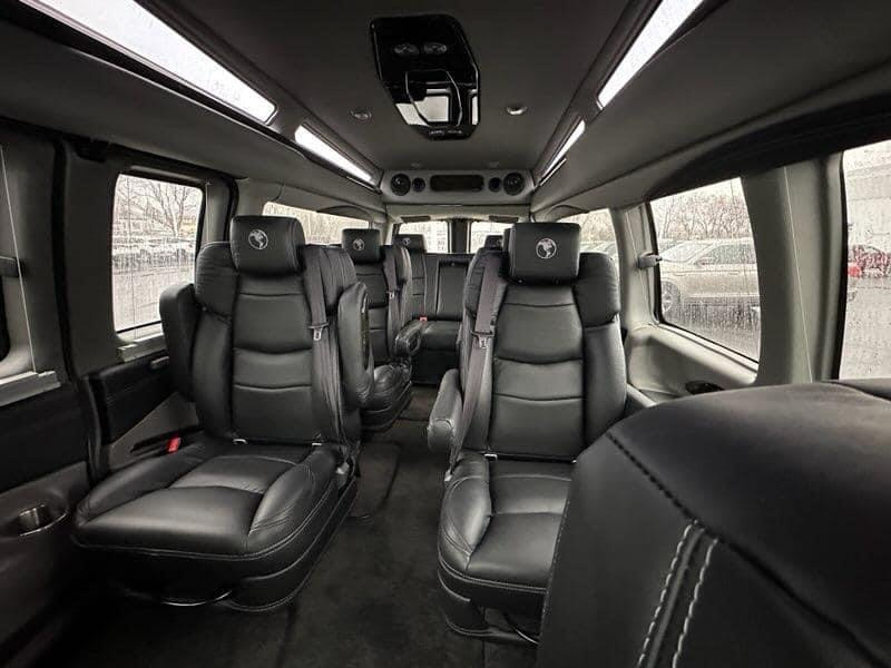 A van with many seats in the back
